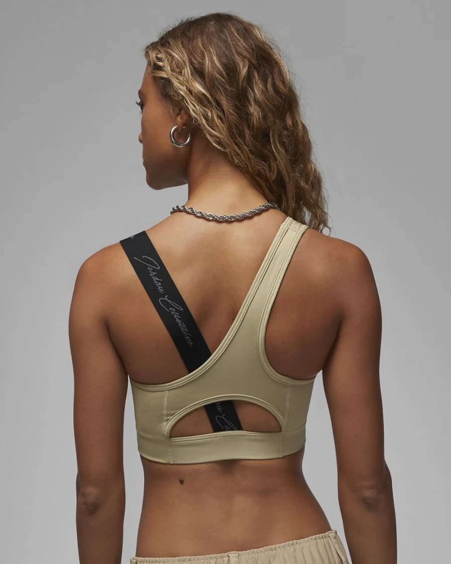 Nike Women's Limestone/Black Asymmetrical Sports Bra - Jordan Paris Collective