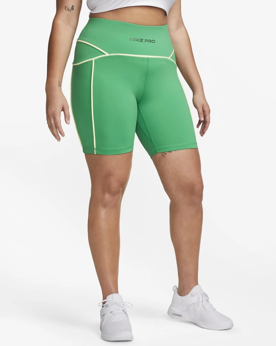 Nike Pro Women's Mid-Rise 7" Biker Shorts - Plus Size in Stadium Green/Barely Volt/Gorge Green