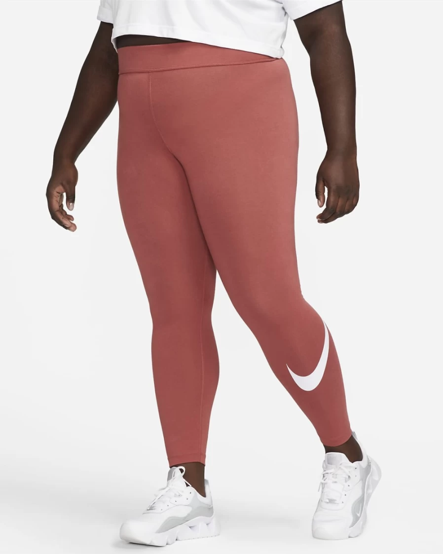 Nike Women's Plus Size Mid-Rise Essential Swoosh Leggings in Canyon Rust/White - Sportswear Collection