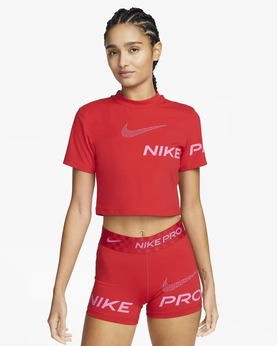 Nike Women's Dri-FIT Pro Short-Sleeve Cropped Graphic Training Top in University Red/Pinksicle