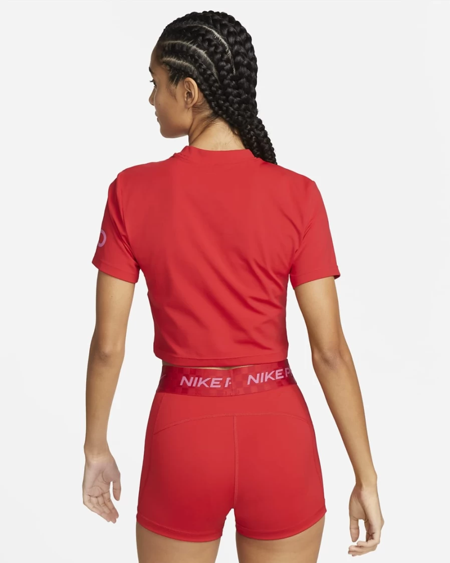 Nike Women's Dri-FIT Pro Short-Sleeve Cropped Graphic Training Top in University Red/Pinksicle